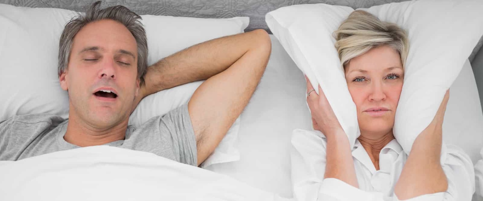 Why a person snores while sleeping?